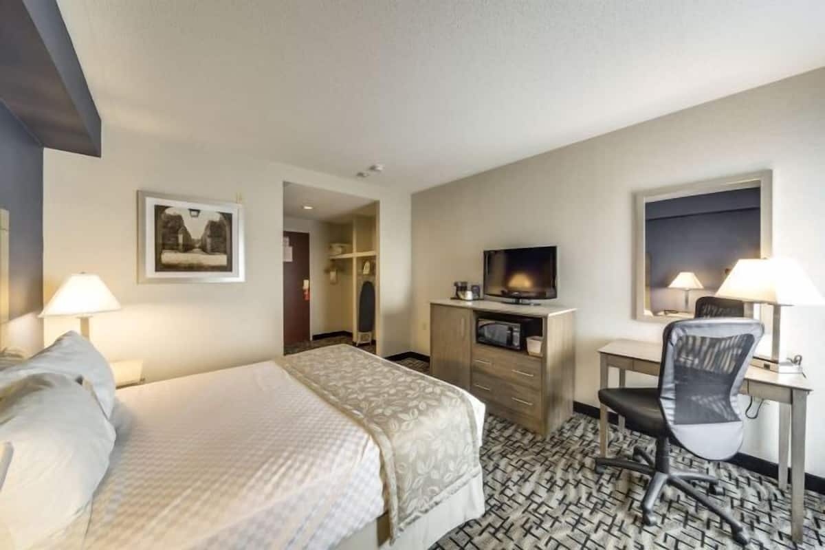 In-room safe, desk, laptop workspace, blackout curtains