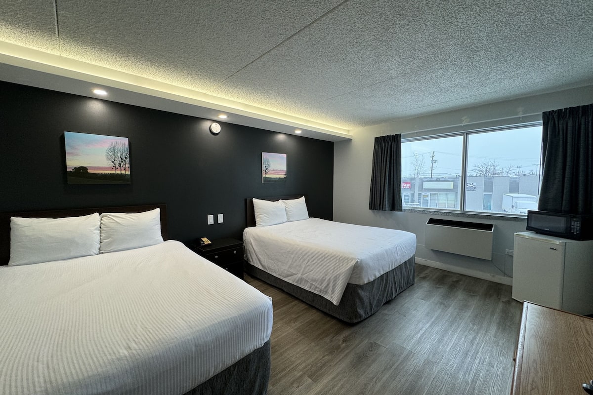 room, 2 queen beds, non smoking | desk, laptop workspace, iron/ironing board, free wifi