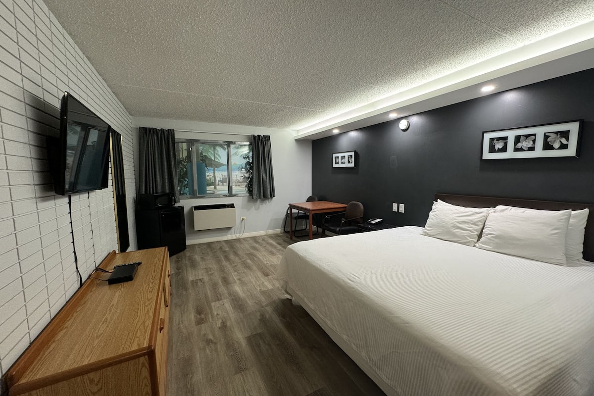 room, 1 king bed, non smoking (pool view) | view from room