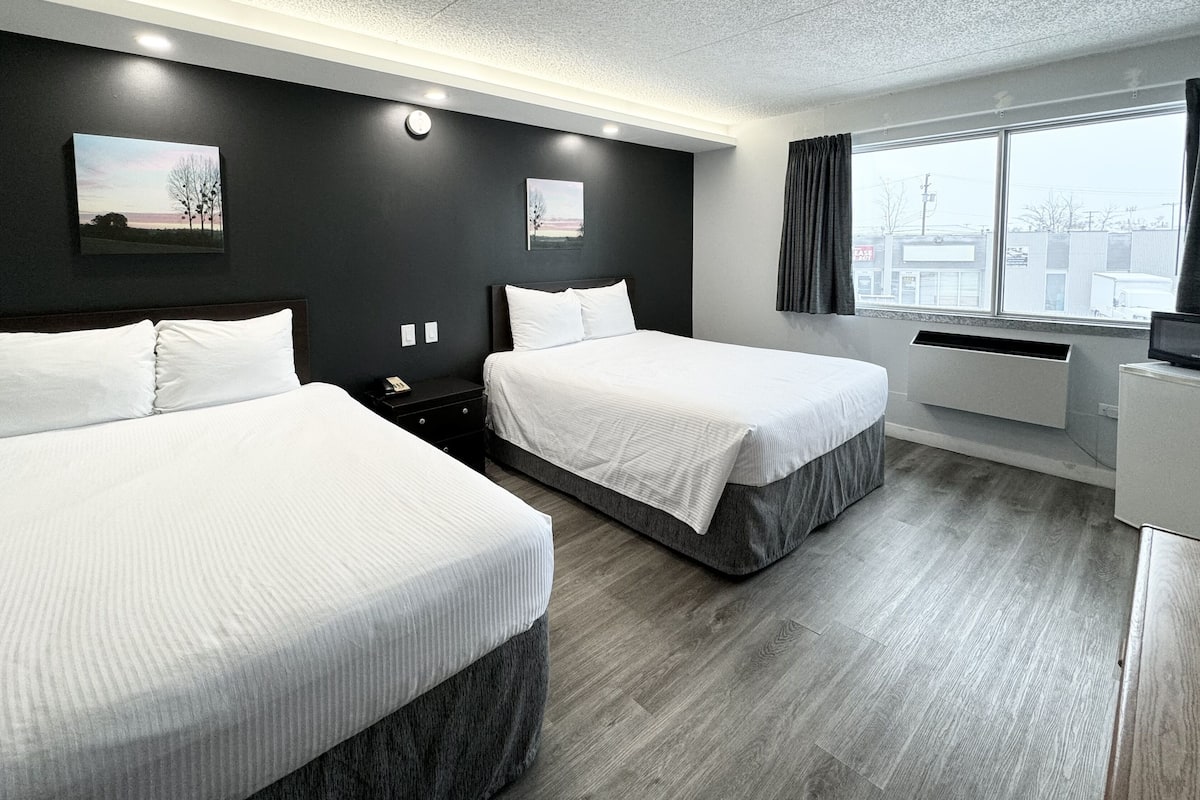 suite, 2 double beds | desk, laptop workspace, iron/ironing board, free wifi