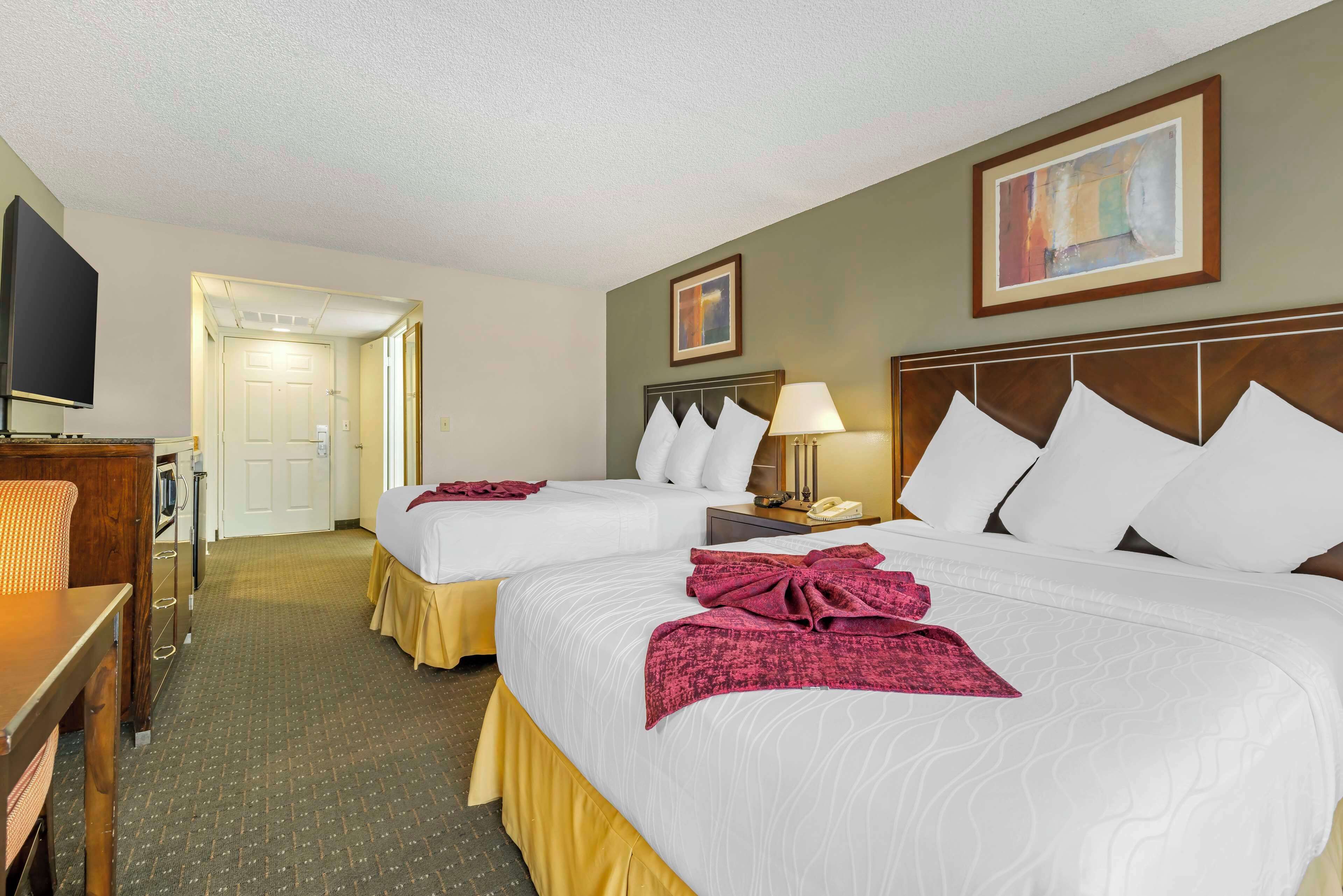 standard room, 2 queen beds, non smoking, refrigerator | in-room safe, blackout curtains, iron/ironing board