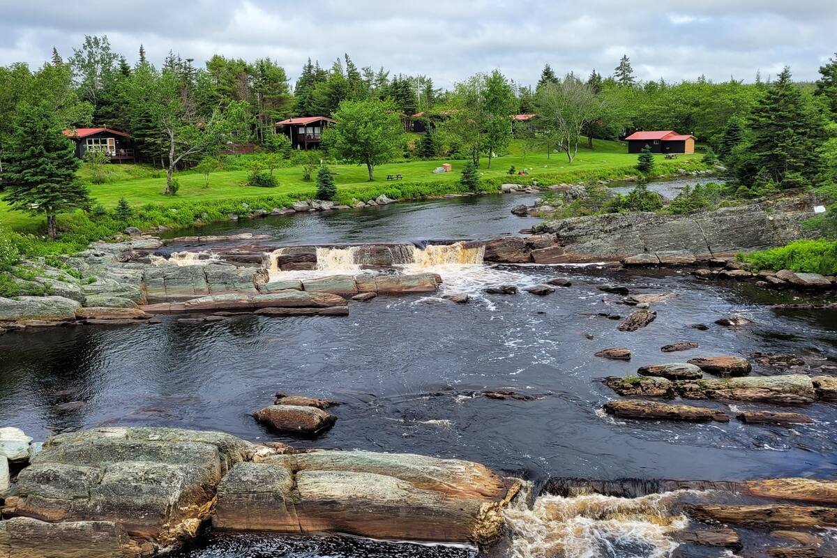 Classic Chalet, 1 Queen Bed, Fireplace, River View | Down comforters, in-room safe, blackout drapes, iron/ironing board