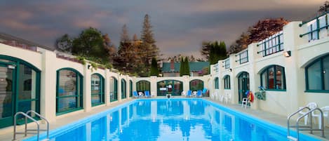 Seasonal outdoor pool, a heated pool, pool loungers