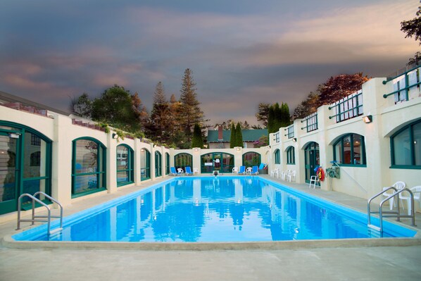 Seasonal outdoor pool, a heated pool, pool loungers