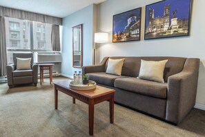 Suite, 1 Queen Balcony, Kitchen | Living area | 42-inch TV with cable channels