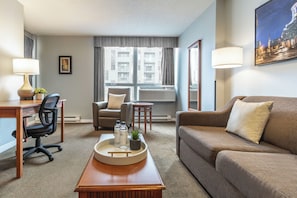 Suite, 1 Queen Balcony, Kitchen | Living area | 42-inch TV with cable channels