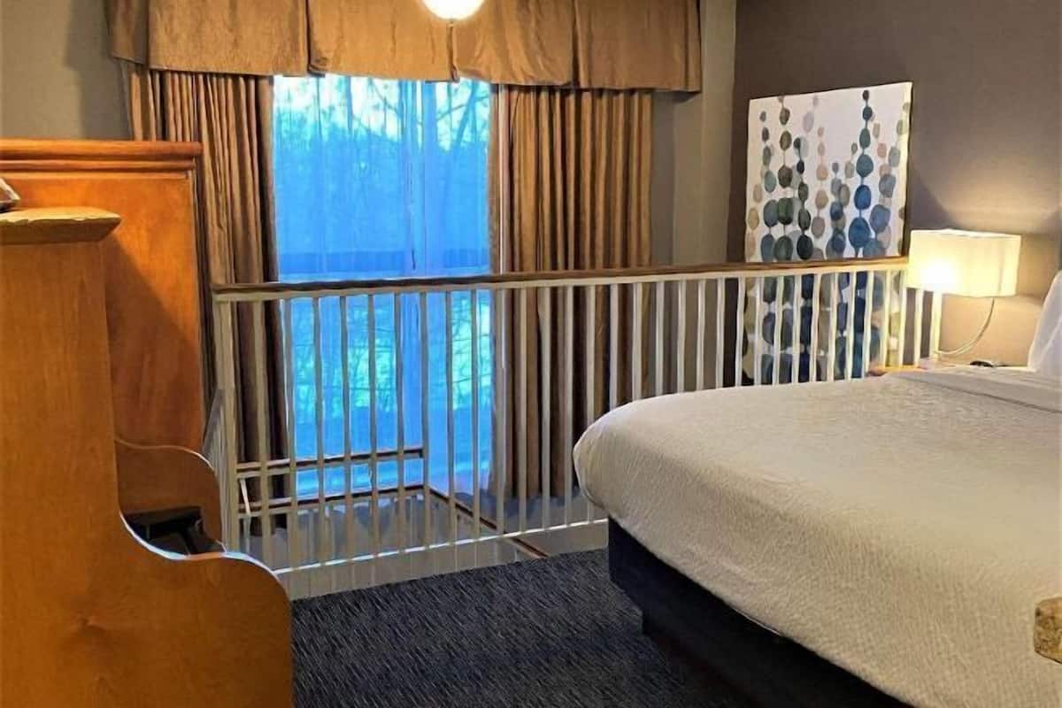 Pillow-top beds, desk, laptop workspace, blackout curtains