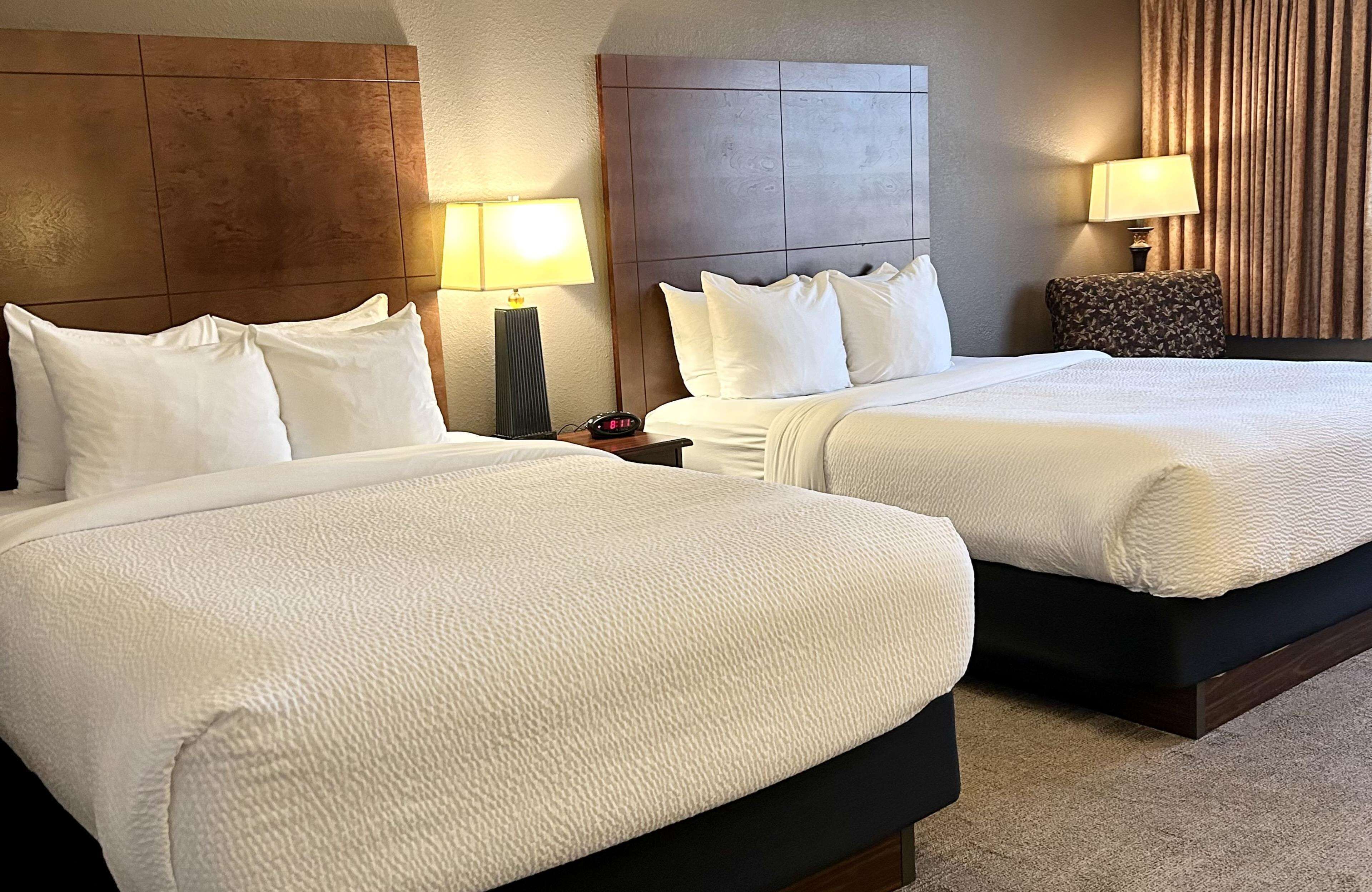 Pillowtop beds, desk, laptop workspace, blackout drapes