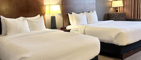 Pillowtop beds, desk, laptop workspace, blackout drapes