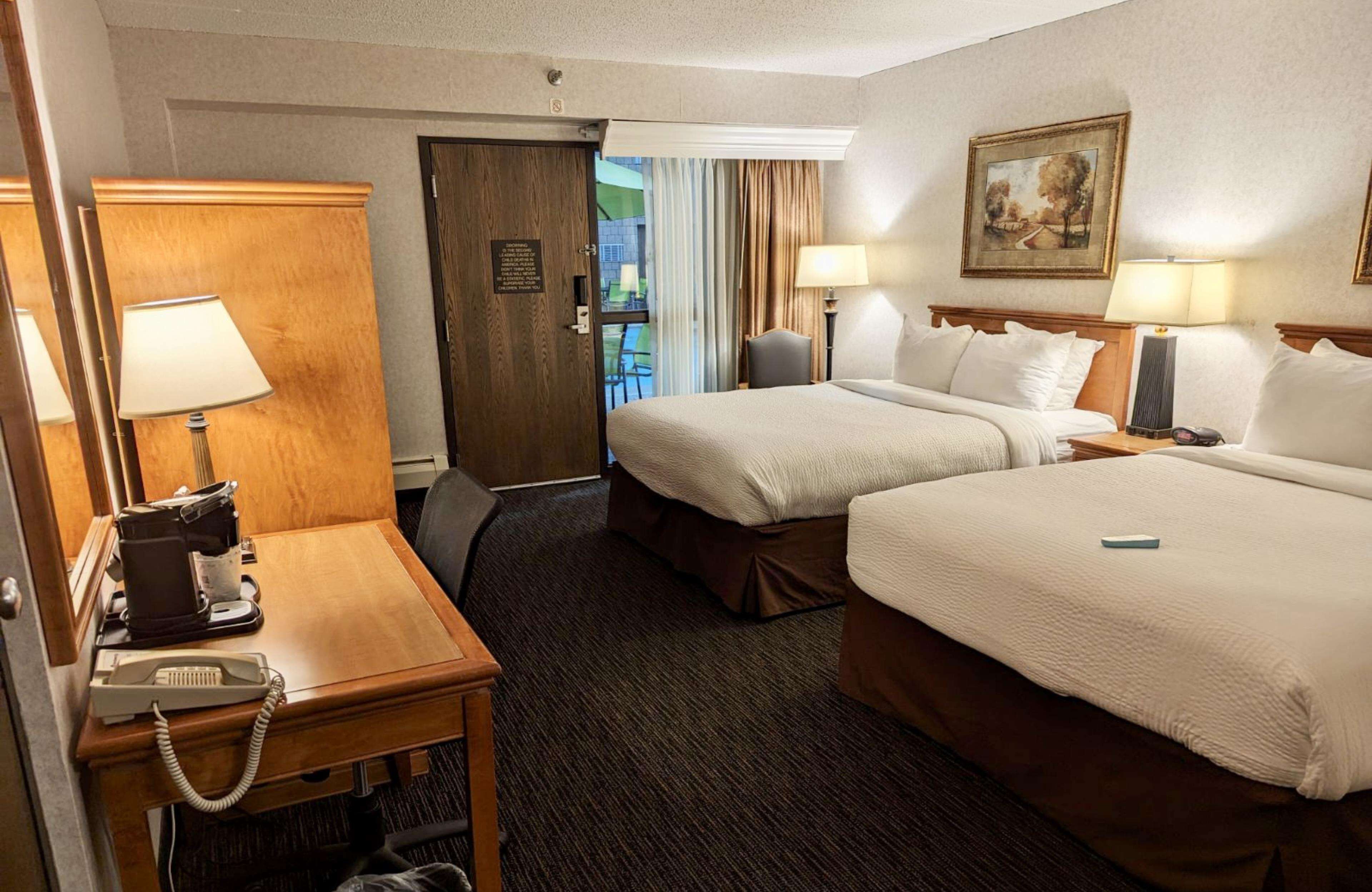 Standard Room, 2 Queen Beds, Refrigerator & Microwave, Poolside | Pillowtop beds, desk, laptop workspace, blackout drapes