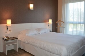 Quadruple Room | Premium bedding, minibar, in-room safe, desk