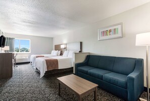 Suite, Plusieurs lits, non-fumeur | Bureau, lit de bébé (gratuit), accès au Wi-Fi (inclus), literie fournie
