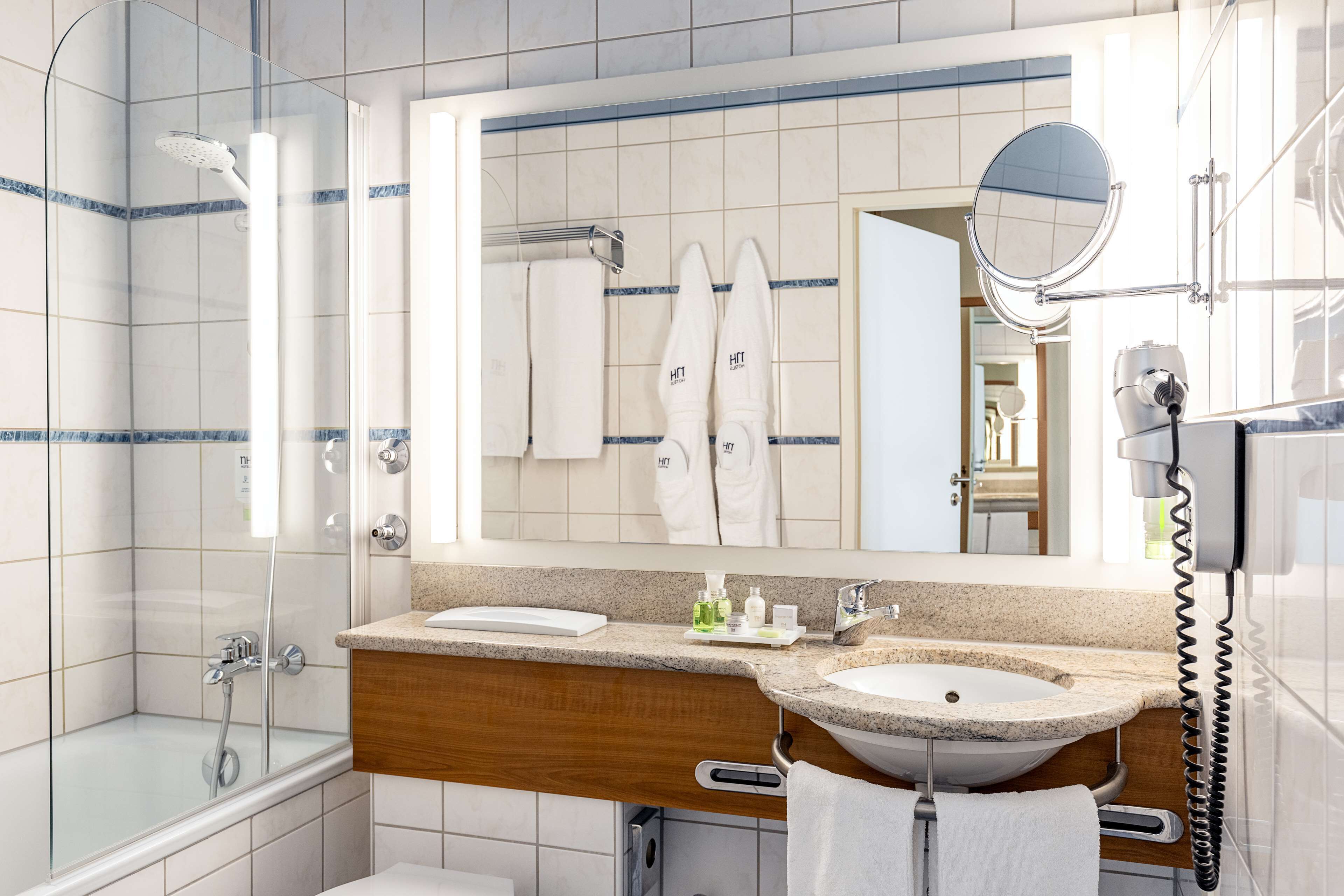 combined shower/bathtub, deep-soaking bathtub, eco-friendly toiletries