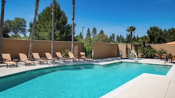 Outdoor pool, open 10:00 AM to 10:00 PM, sun loungers