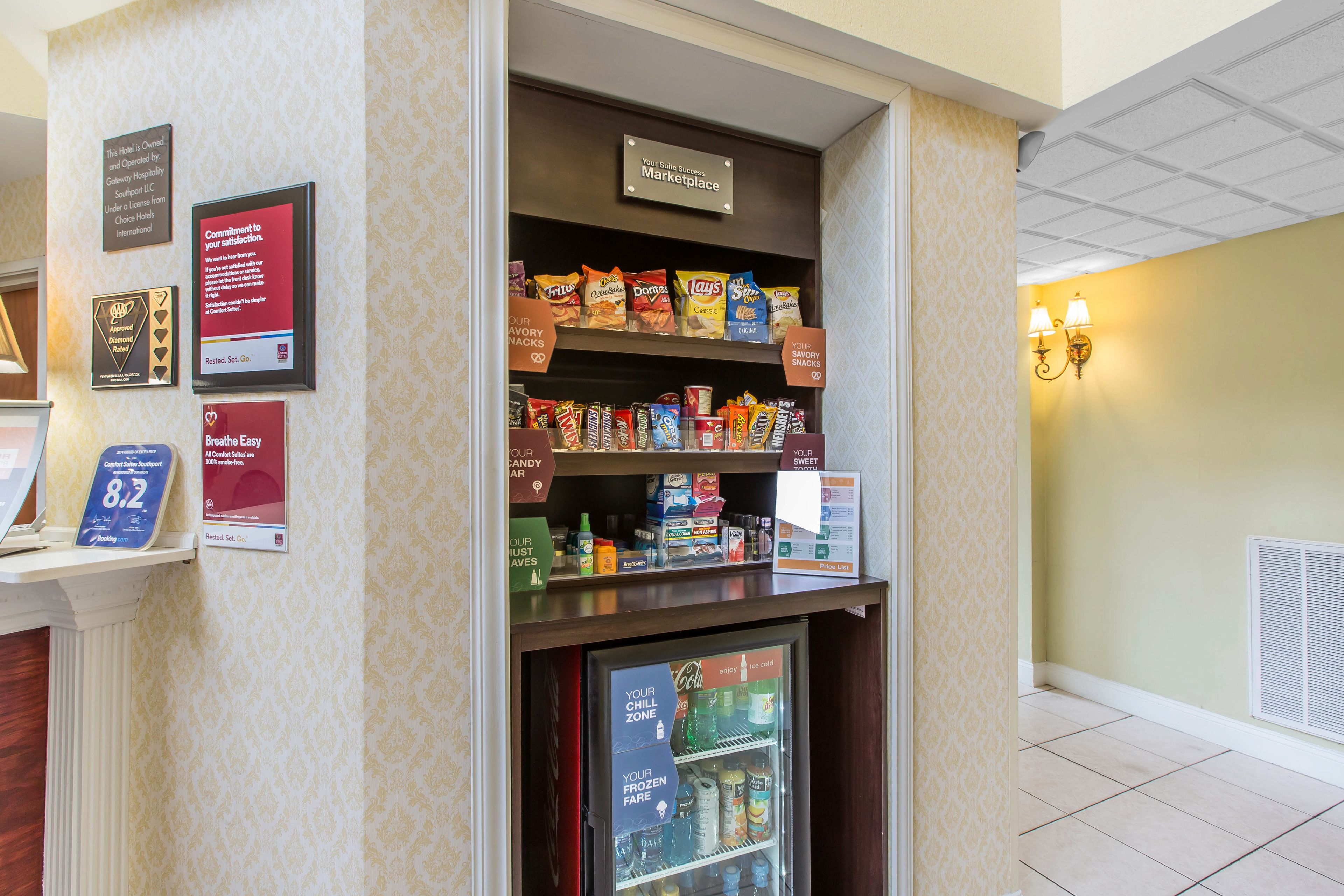 A snack vending machine with various snack options and a refrigerated section.