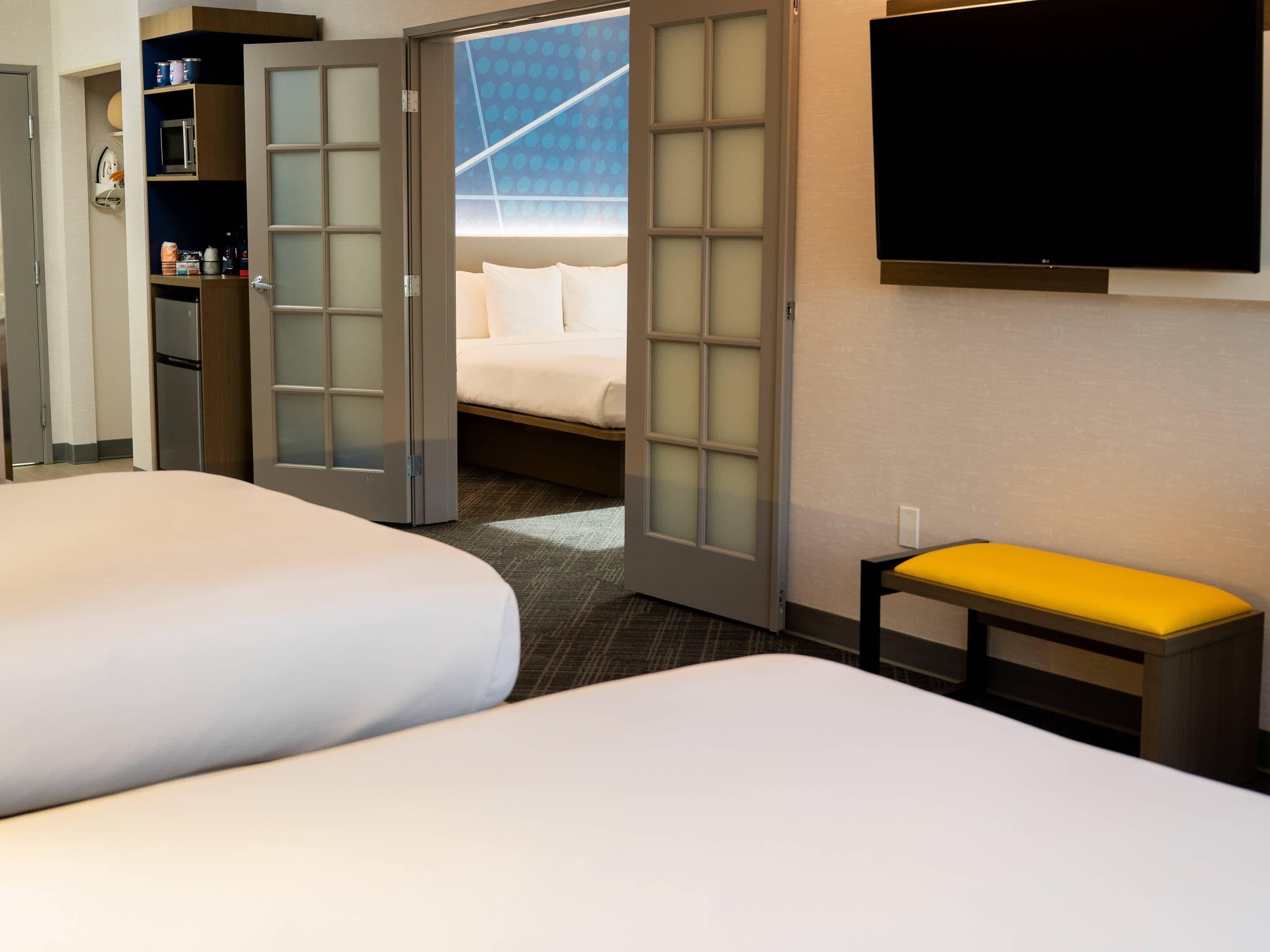 Suite, Non Smoking (1 King Bed & 2 Queen Beds) | Premium bedding, pillow-top beds, desk, laptop workspace