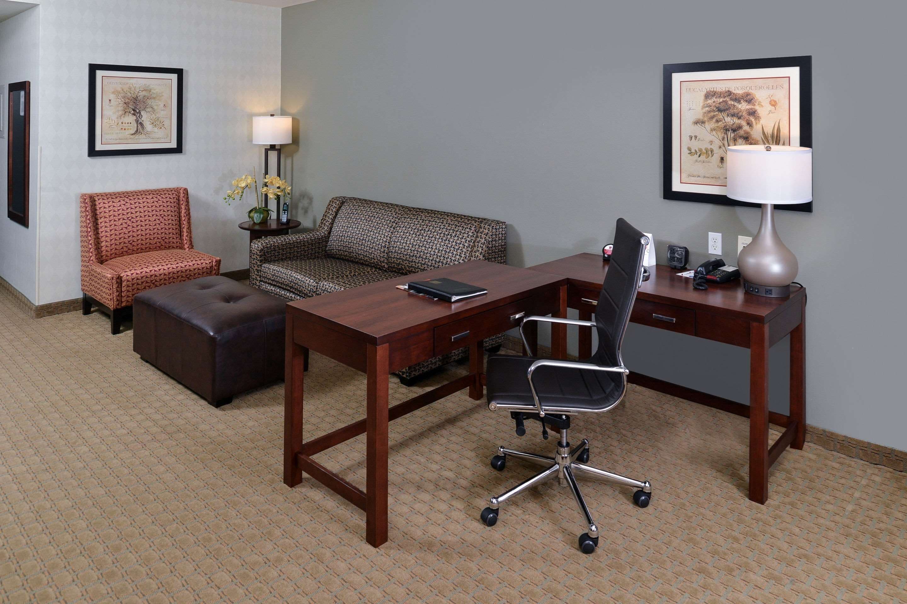 premium bedding, pillow-top beds, desk, laptop workspace