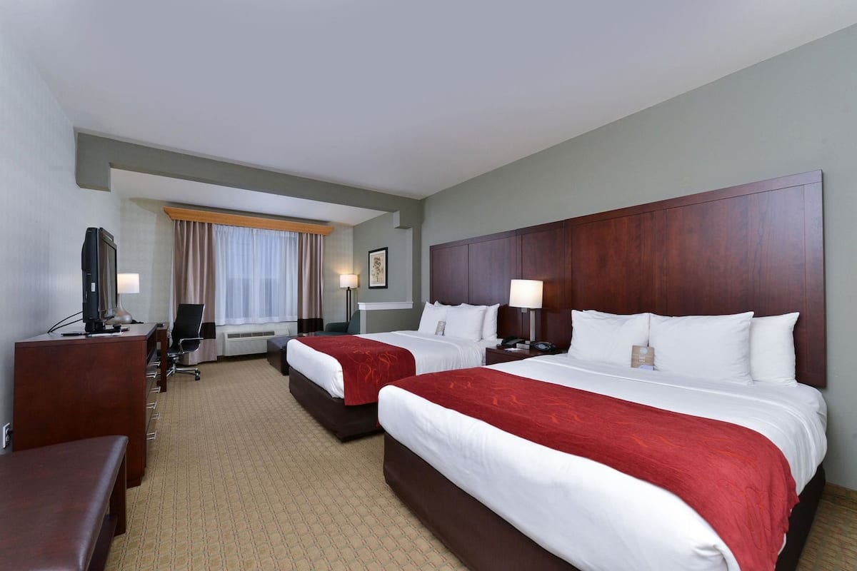 Premium bedding, pillowtop beds, desk, laptop workspace