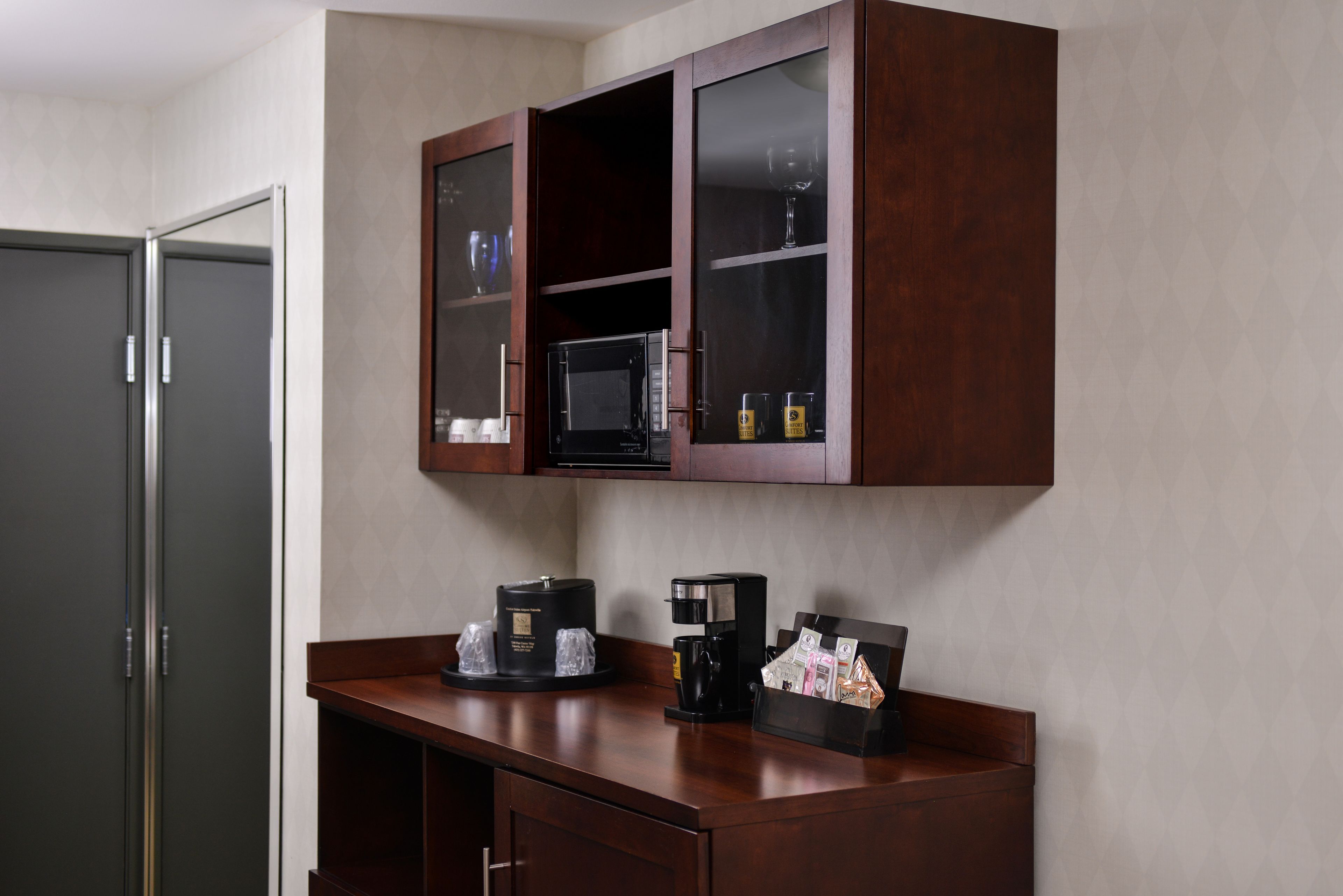 premium bedding, pillow-top beds, desk, laptop workspace