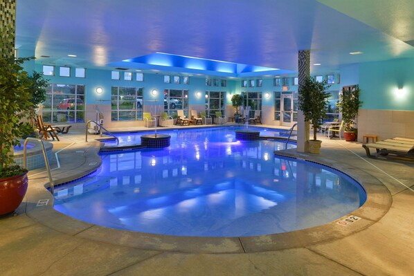 Indoor pool, open 8:00 AM to 10:00 PM, pool loungers