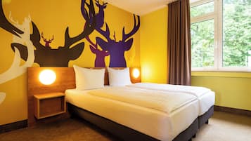 Escritorio, sistema de insonorizaciĂłn, wifi gratis y ropa de cama