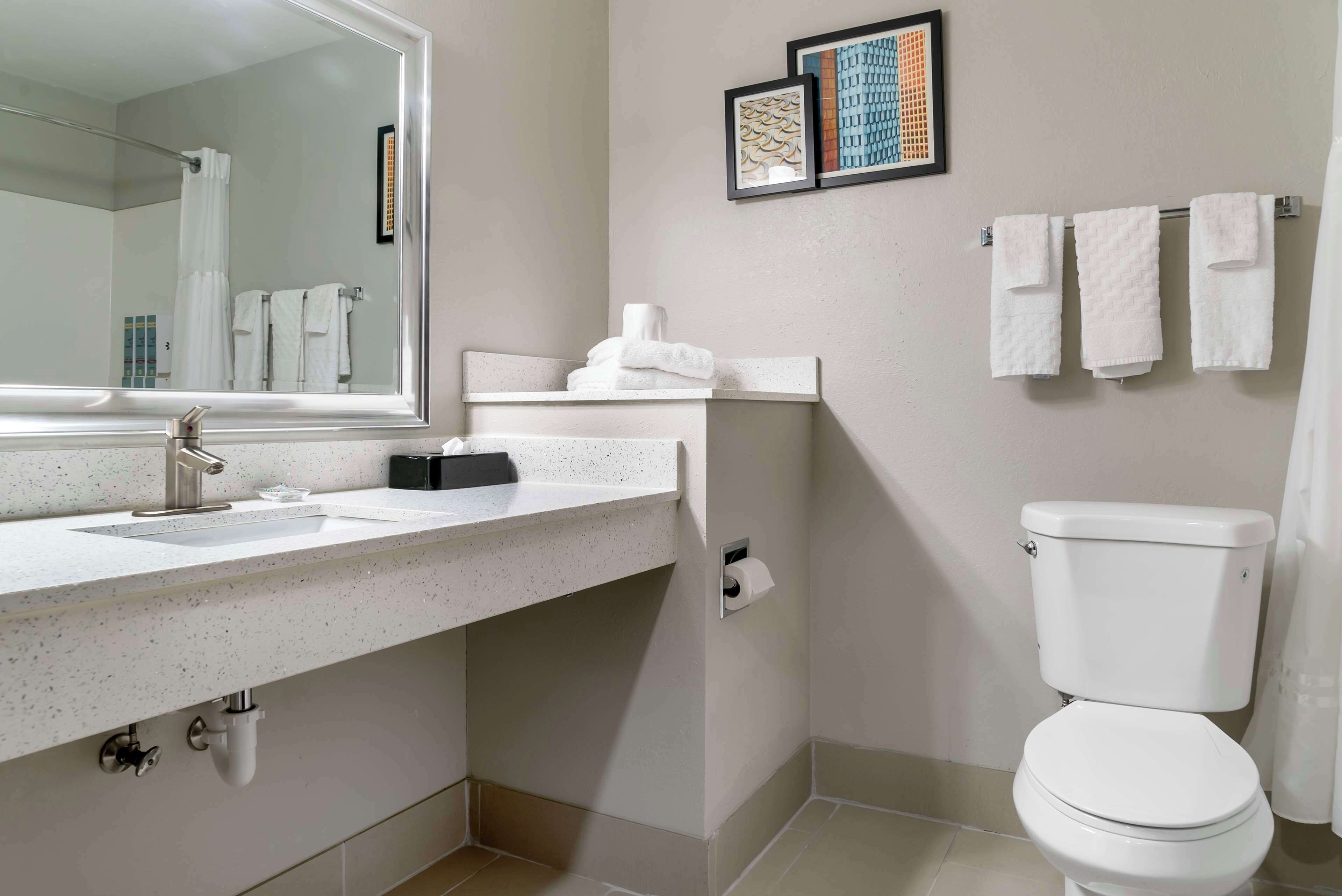 standard room, 2 queen beds, non smoking, refrigerator | bathroom | free toiletries, hair dryer, towels