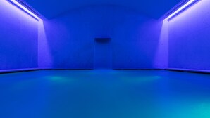 A room with a sloped ceiling and a central door. - Hotel Cristoforo Colombo – Preferred Hotels & Resorts (Milan)