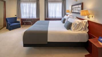 Premium bedding, down comforters, minibar, in-room safe
