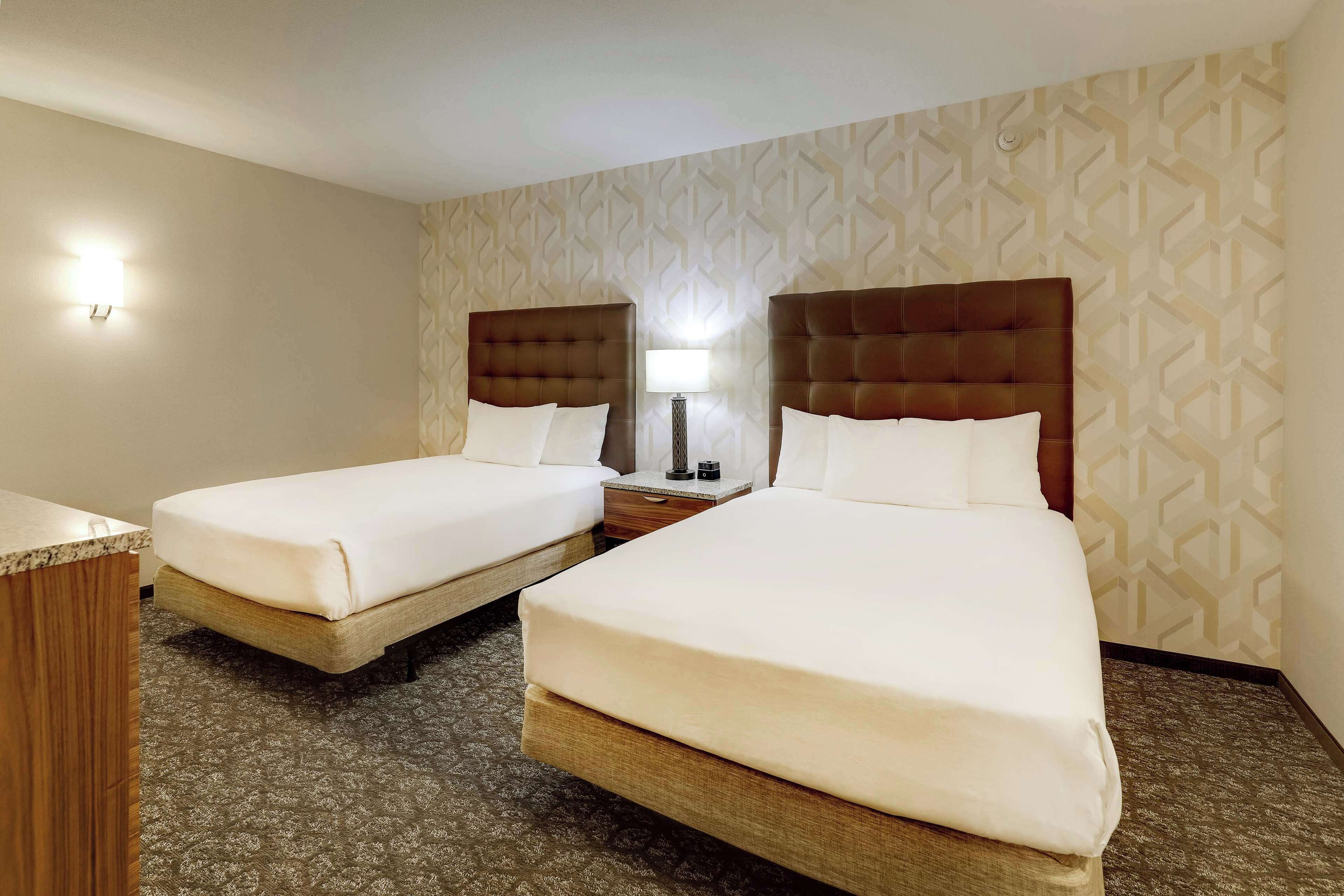 Suite, 2 Queen Beds, Accessible (Sofa Sleeper, Tub, 2 Rooms) | Pillowtop beds, desk, laptop workspace, blackout drapes