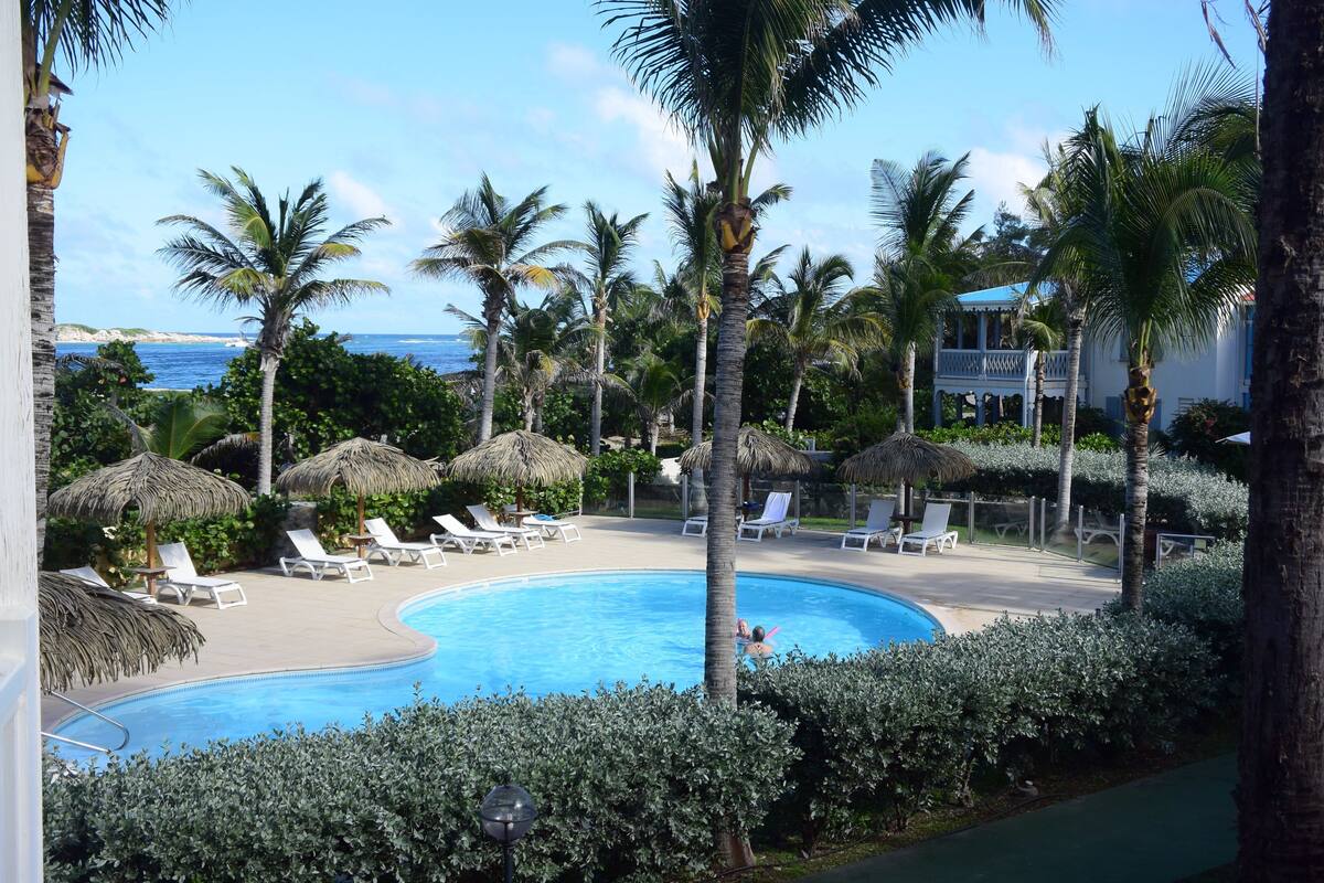 Family Duplex, Ocean View | Pool | Outdoor pool, pool umbrellas, sun loungers