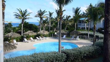 Family Duplex, Ocean View | Pool | Outdoor pool, pool umbrellas, pool loungers