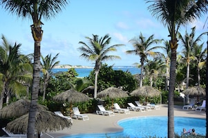 Outdoor pool, pool umbrellas, sun loungers
