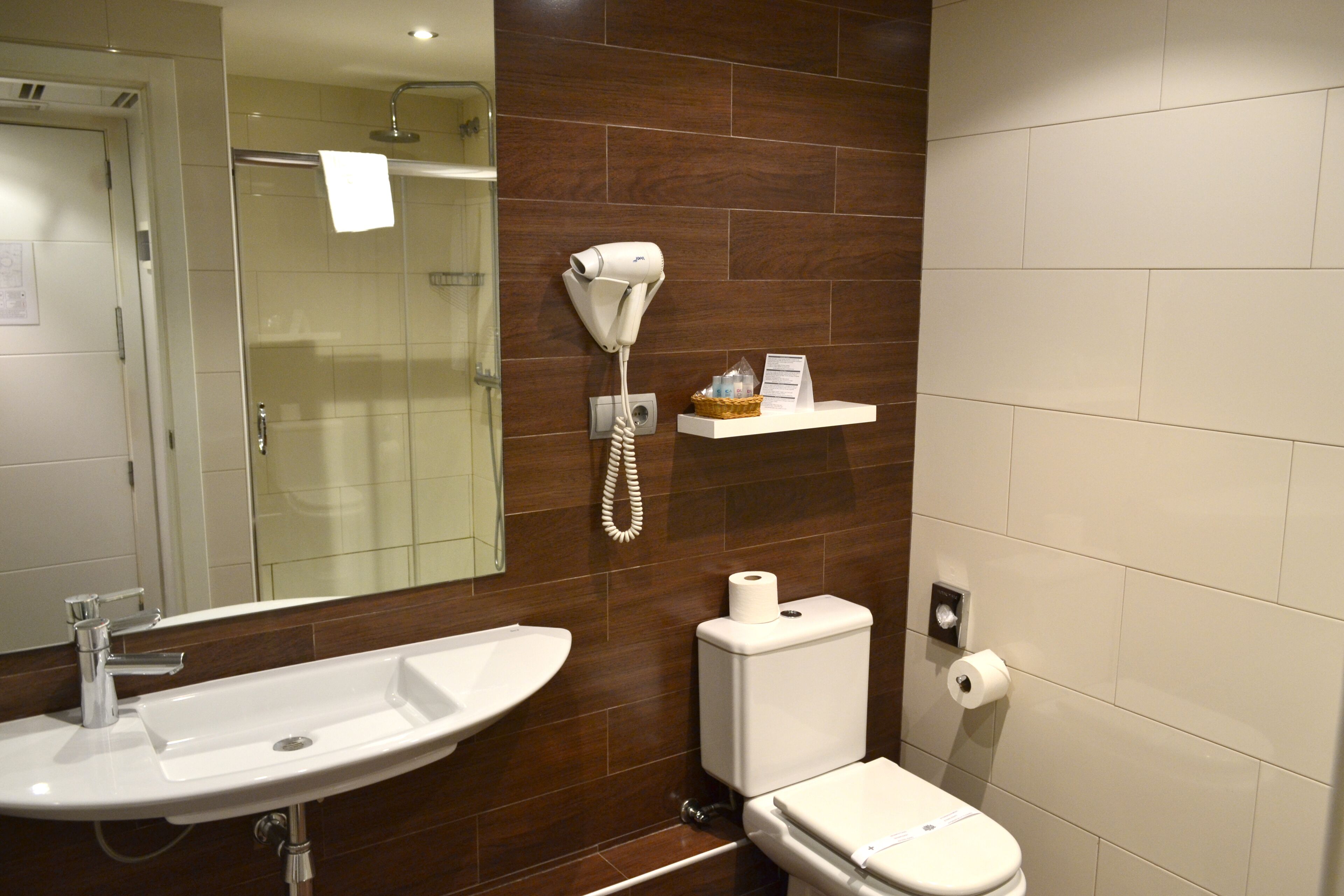 double room | bathroom | rainfall showerhead, hair dryer, towels