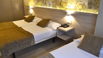 Triple Room | Premium bedding, desk, laptop workspace, blackout curtains
