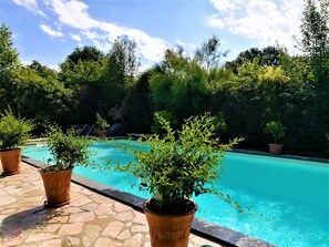 Outdoor pool, open 9 AM to 7 PM, sun loungers