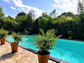Outdoor pool, open 9 AM to 7 PM, sun loungers