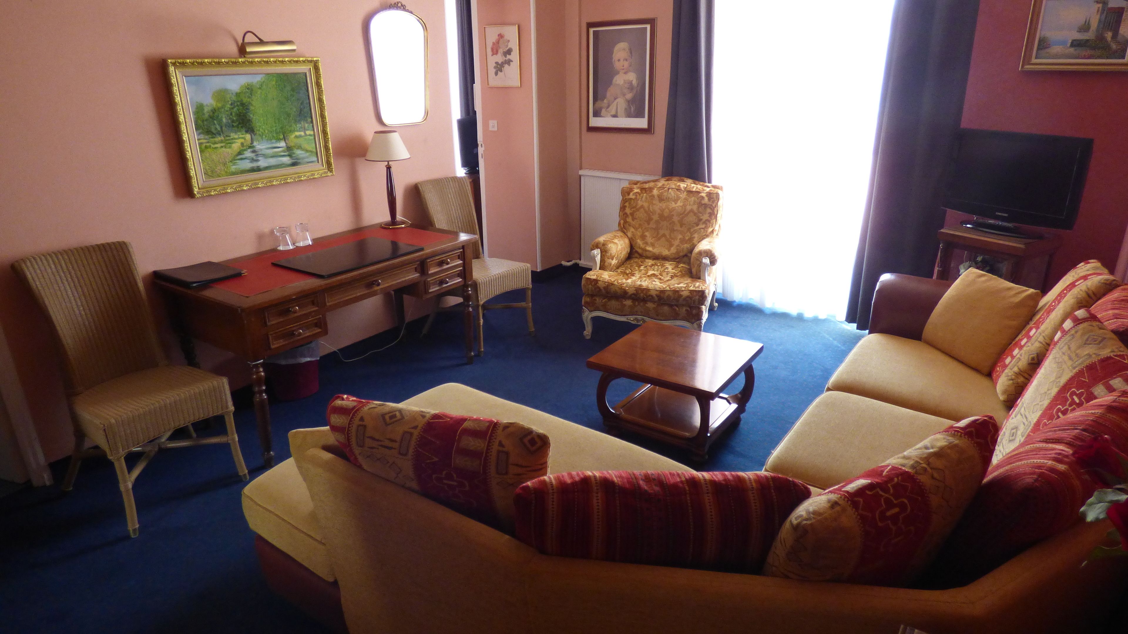 suite, terrace, pool view | living area | flat-screen tv