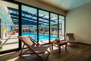 Indoor pool, sun loungers