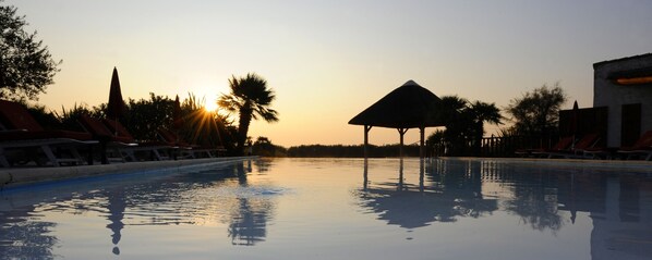 Indoor pool, outdoor pool, pool umbrellas, sun loungers