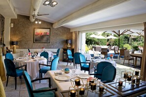 Lunch, dinner served; French cuisine, pool views