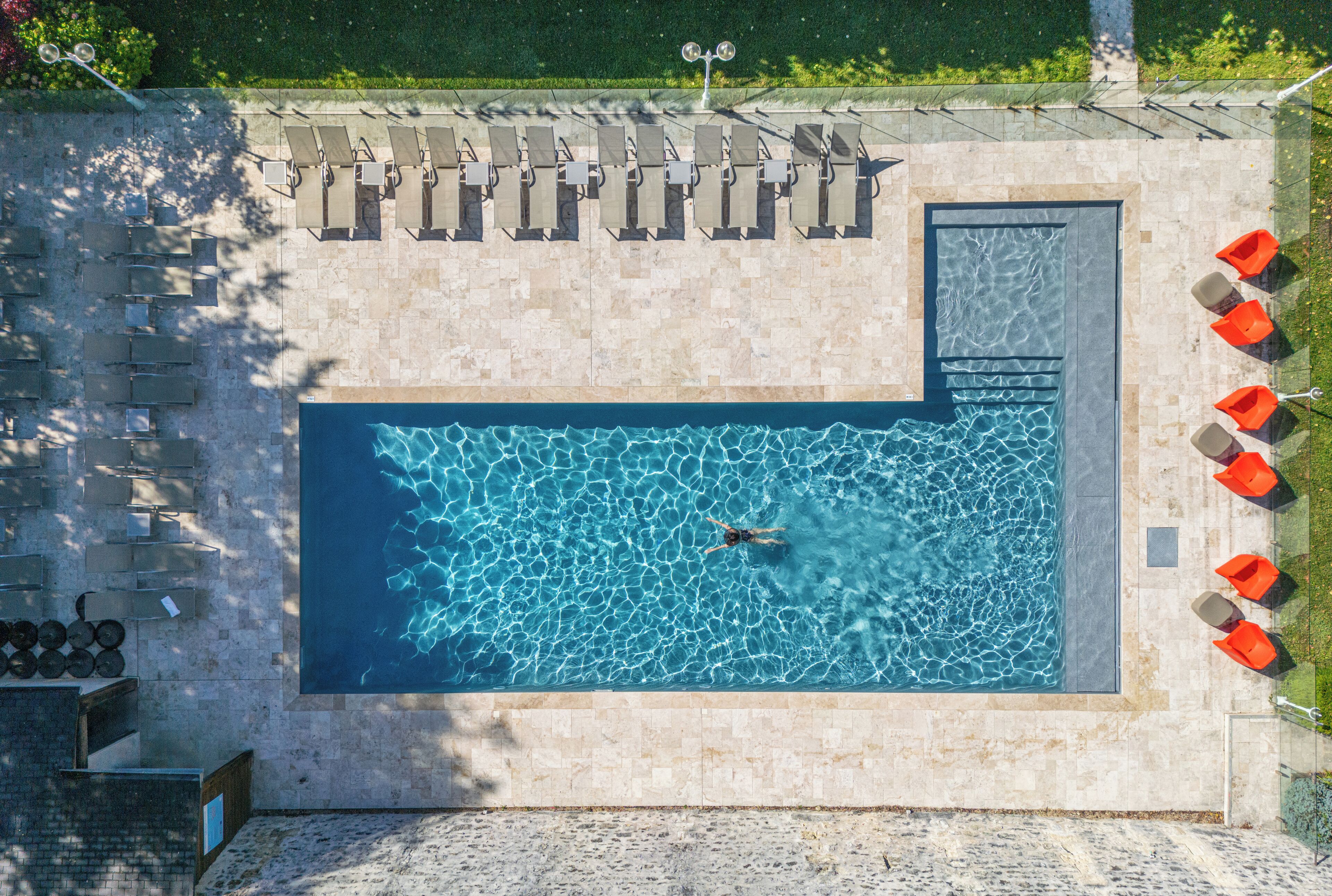 outdoor pool, pool umbrellas, pool loungers