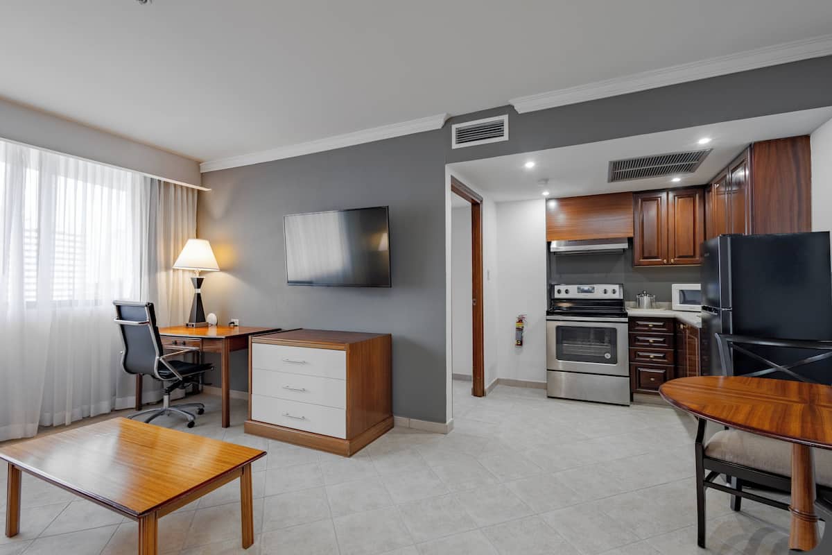 Suite, 1 Bedroom, Balcony | In-room safe, desk, laptop workspace, blackout curtains