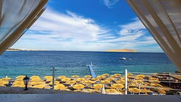 Private beach, free beach shuttle, beach cabanas, sun-loungers