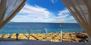 Private beach, free beach shuttle, beach cabanas, sun loungers