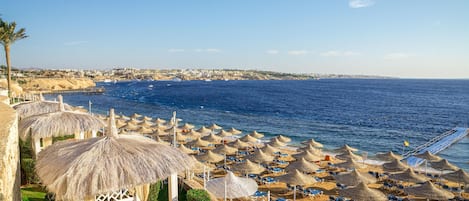Private beach, free beach shuttle, beach cabanas, sun loungers