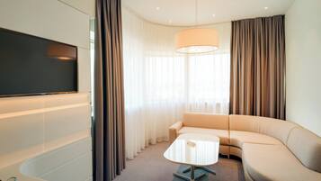 Suite, 1 King Bed (Additional Living Area) | Premium bedding, minibar, desk, soundproofing