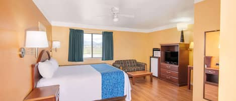 Room, 1 King Bed, Non Smoking | Desk, iron/ironing board, free cots/infant beds, rollaway beds