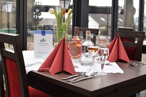 Breakfast, lunch, dinner served; local cuisine, al fresco dining 