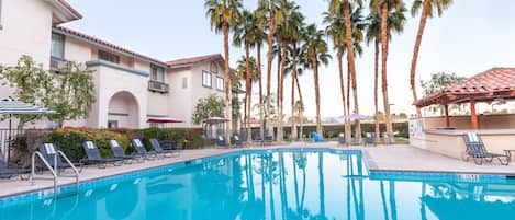 Outdoor pool, open 8:00 AM to 10:00 PM, sun loungers