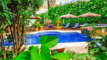 Outdoor pool, open 9:00 AM to 7:00 PM, pool umbrellas, sun loungers